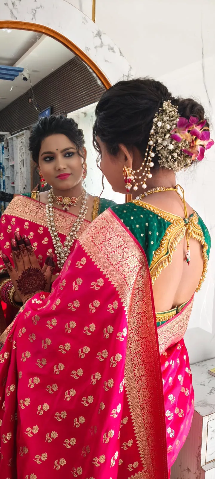Fresh pink bridal look with delicate detailing
